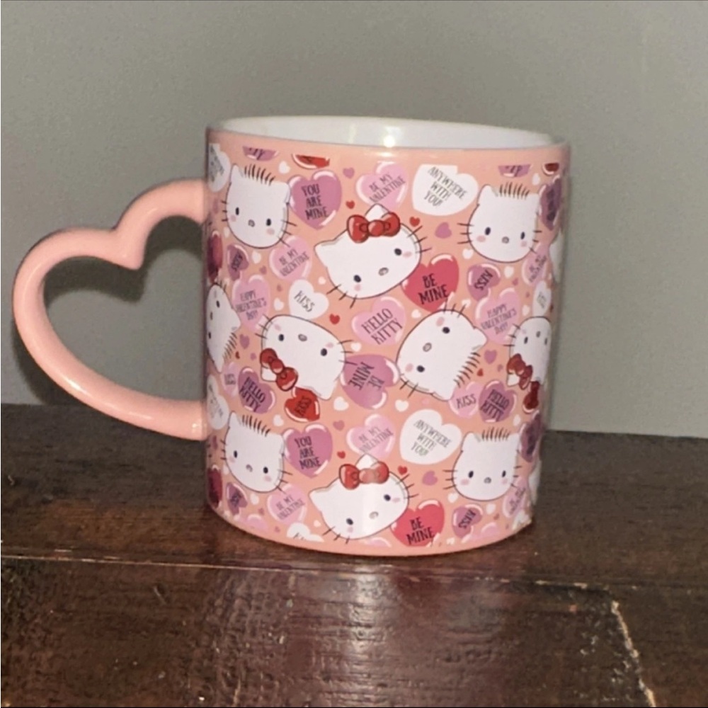 Never used. Sanrio Pink Hello Kitty Heart Handle Mug